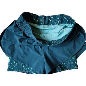 Athleta 2-in 1 Women Athletic Turquoise Shorts Size Medium